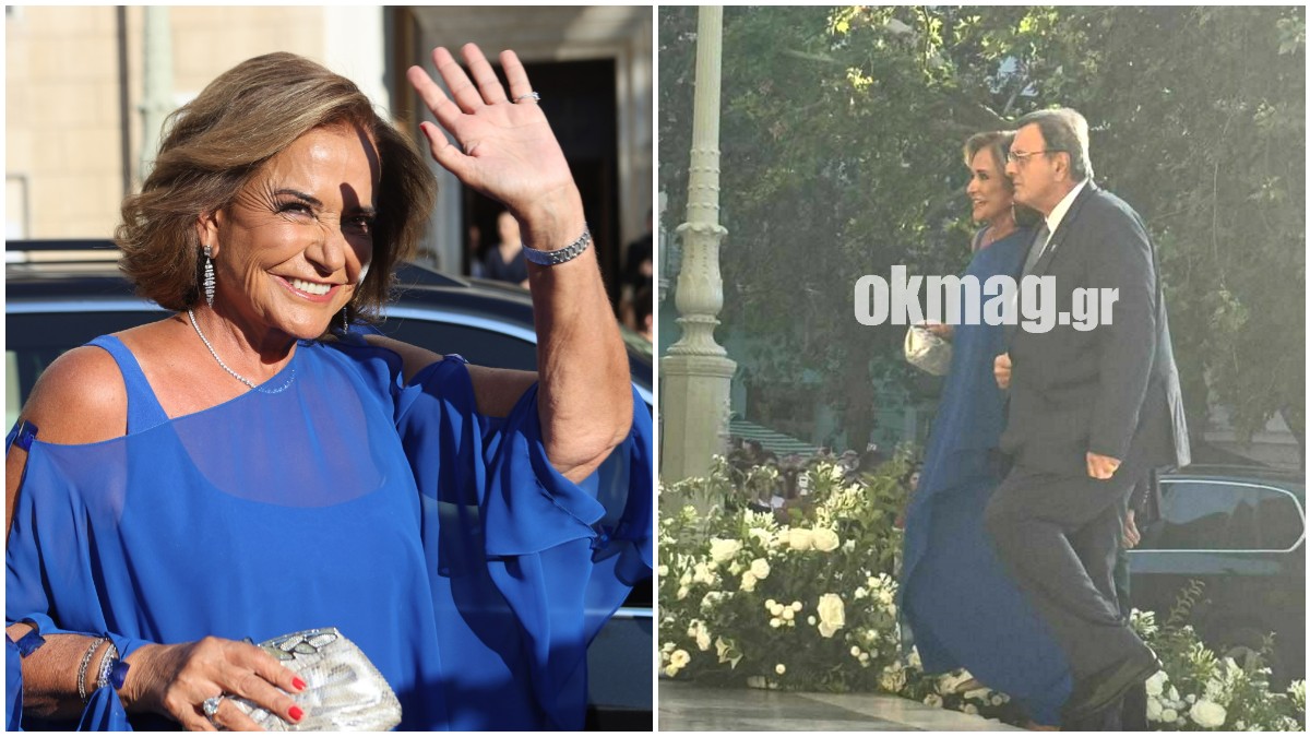 Ντόρα Μπακογιάννη: Με εντυπωσιακό μπλε ρουά φόρεμα στον γάμο της Θεοδώρας με τον Μάθιου Κουμάρ